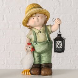 Figur Landdreng i keramik gr�n og gul m/fyrfadsstage L:25 B:13 H:41 cm